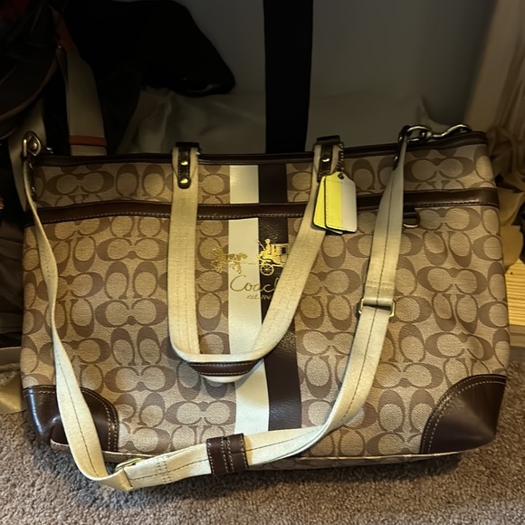 Coach baby bag. Comes with changing pad